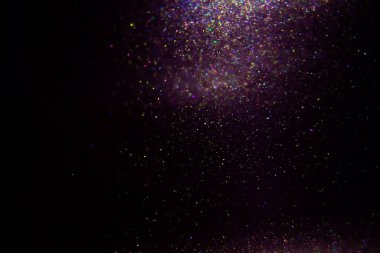 Abstract purple, magenta background with sparkles and shadows. Fluidity, waves, glitter, fluid, glitter, shimmer.