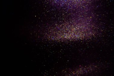 Abstract purple, magenta background with sparkles and shadows. Fluidity, waves, glitter, fluid, glitter, shimmer.