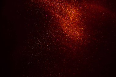 Abstract red background with sparkles and shadows. Fluidity, waves, glitter, fluid, glitter, shimmer.