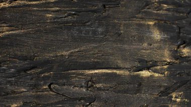 Bas-relief smoky textured spots with golden starry highlights