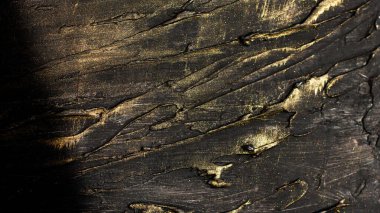 Pattern black textural stripes with golden plating