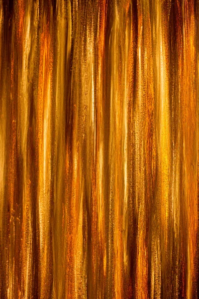 Abstract striped background. Golden stripes. Shadow, gold, yellow, orange, gold. Trees, stripes, lines, vertical.