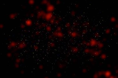 Black background with red stains, blur. Multi-colored sequins, stars, dust, glitter.