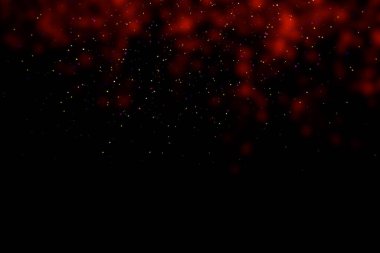 Black background with red stains, blur. Multi-colored sequins, stars, dust, glitter.