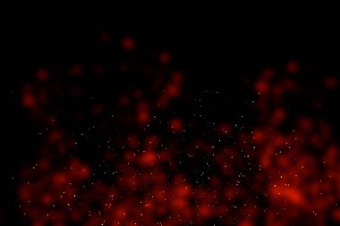 Black background with red stains, blur. Multi-colored sequins, stars, dust, glitter.