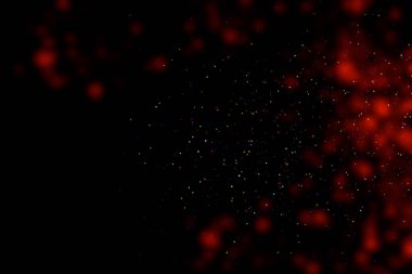 Black background with red stains, blur. Multi-colored sequins, stars, dust, glitter.