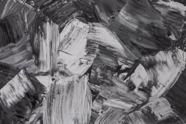 Rough strokes with a spatula. Plaster, painting. Gypsum, cement, wall. View. Substrate, under For an inscription. Grey, black and white.