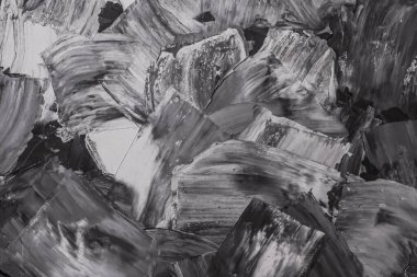 Rough strokes with a spatula. Plaster, painting. Gypsum, cement, wall. View. Substrate, under For an inscription. Grey, black and white.