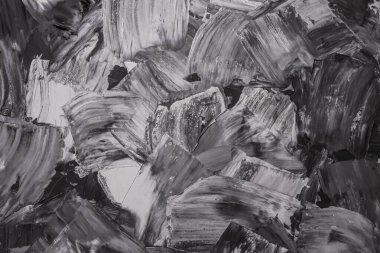 Rough strokes with a spatula. Plaster, painting. Gypsum, cement, wall. View. Substrate, under For an inscription. Grey, black and white.