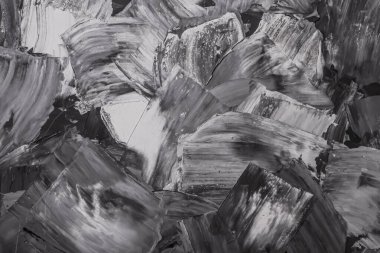 Rough strokes with a spatula. Plaster, painting. Gypsum, cement, wall. View. Substrate, under For an inscription. Grey, black and white.