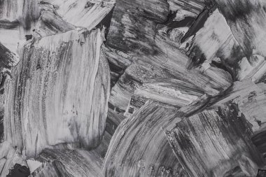 Rough strokes with a spatula. Plaster, painting. Gypsum, cement, wall. View. Substrate, under For an inscription. Grey, black and white.