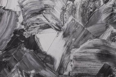 Rough strokes with a spatula. Plaster, painting. Gypsum, cement, wall. View. Substrate, under For an inscription. Grey, black and white.