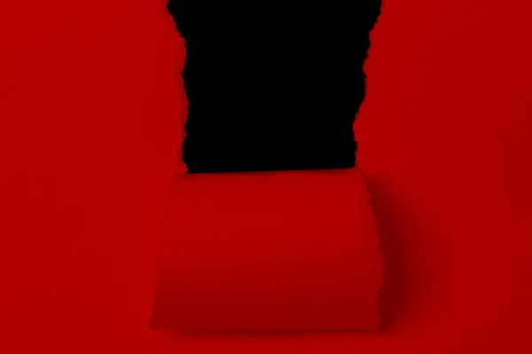 Torn paper in red and black with shadow. Contrast. isolated.