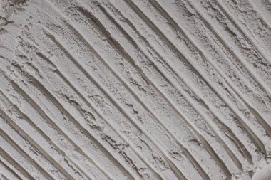 Un dokusu, toz, beyaz kum. - Beyaz. Şişkinlik, göçükler, çatlaklar, damga, krater.