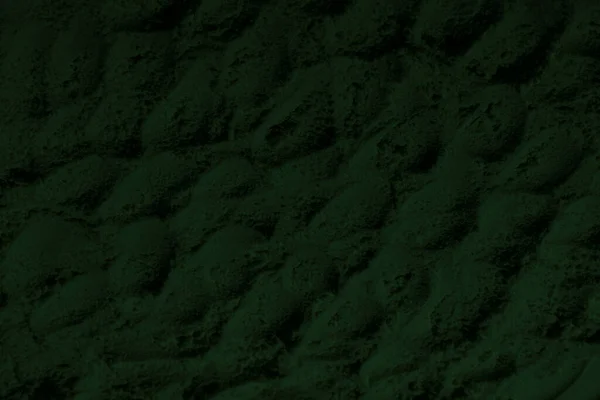 地球温暖化の概念設計のための空間と黒緑の背景 古い石の壁の瓦礫の表面 接近中だ 濃いエメラルドグリーンの色 しっかりしてる グランジ グリーン アイシャドウ クレーターだ 緑の大地 — ストック写真