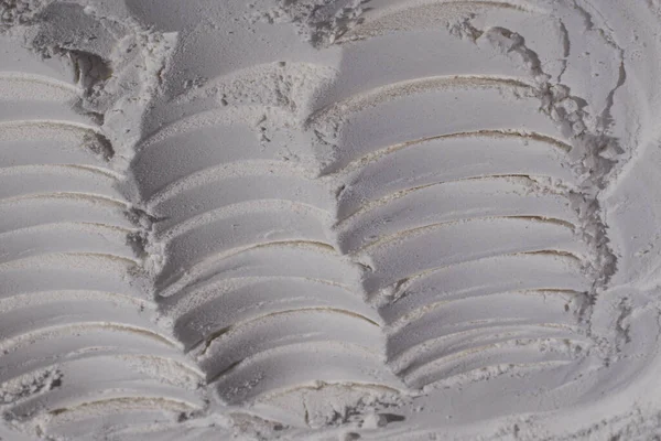 Un dokusu, toz, beyaz kum. - Beyaz. Şişkinlik, göçükler, çatlaklar, damga, krater.