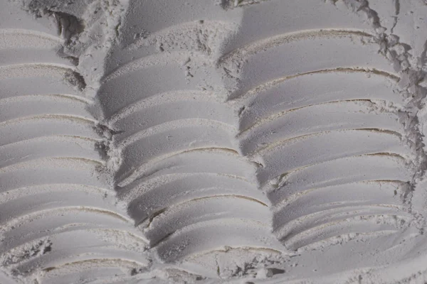 Texture of flour, powder, white sand. White. Bulge, dents, cracks, imprint, crater.