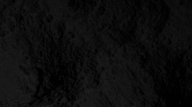 Siyah doku. Karanlık arka plan. Kum, toz, kömür, dalgalar, çizgiler, daireler. Dağlar. Çatlak, çatlak. Karanlık, karanlık, gölgeler.