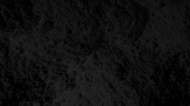 Siyah doku. Karanlık arka plan. Kum, toz, kömür, dalgalar, çizgiler, daireler. Dağlar. Çatlak, çatlak. Karanlık, karanlık, gölgeler.