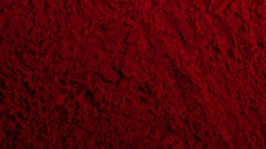 Kırmızı doku. Barut arkaplanı. Pedra, kum. Kırmızı renk. Koyu kırmızı. Yoğun koyu kırmızı. Çatlaklar, dalgalar, çizgiler, daireler, depresyonlar. Dışbükey. Afiş, reklam, yazı için.