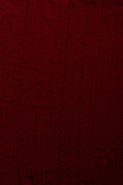 Kırmızı doku. Barut arkaplanı. Pedra, kum. Kırmızı renk. Koyu kırmızı. Yoğun koyu kırmızı. Çatlaklar, dalgalar, çizgiler, daireler, depresyonlar. Dışbükey. Afiş, reklam, yazı için.