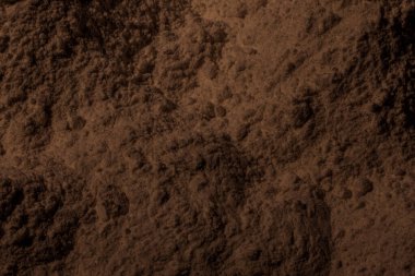 Kil, kum, toprak dokusu. Kahverengi. Geçmişi. Çatlak, çatlak, dalga, dağ, çember, oyuk. girintilenmiş