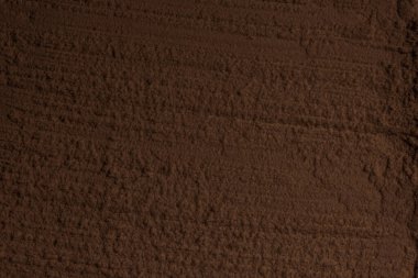 Kil, kum, toprak dokusu. Kahverengi. Geçmişi. Çatlak, çatlak, dalga, dağ, çember, oyuk. girintilenmiş