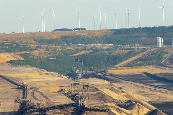 Garzweiler, Germany: Coal opencast mine with giant excavator in the pit.