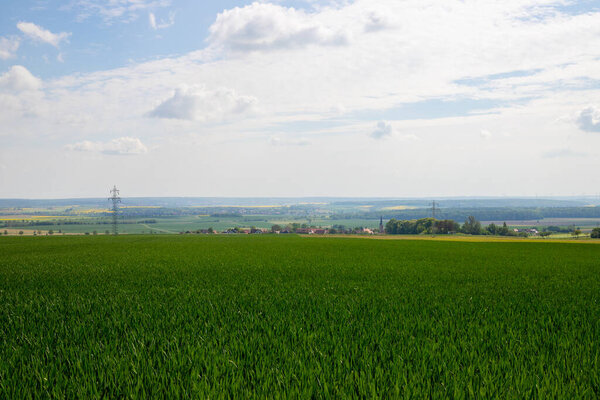 Landscape shot of fields and cloudy sky. High quality photo