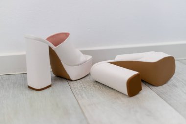 Platform high heels on a tapped in white with block heel as mules. High quality photo clipart