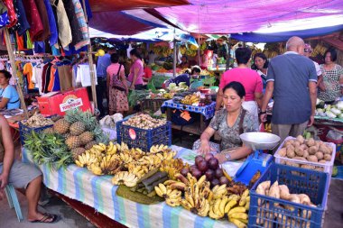 Cebu, Philippines - Feb 17, 2019: people selling goods at local market in Cebu, Philippines