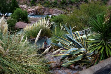 Cacheuta hot springs - people relaxing at Cacheuta hot springs, Argentina
