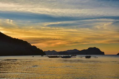 Tropical sunset at El Nido lagoon in Palawan island, Philippines