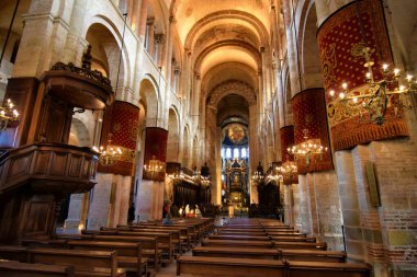 Toulouse, France - January 14, 2023: Interior of the basilica of Saint-Sernin in Toulouse. The Romanesque church is a pilgrimage destination on Routes of Santiago de Compostela. 