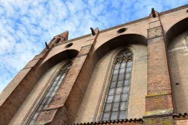 Toulouse, France - January 14, 2023: Beautiful exterior view of the Dominican monastery Couvent des Jacobins in Toulouse, France