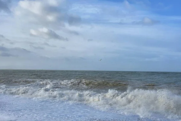 stock image Beautiful view of English Channel (la manche) with waves, wind and clouds at Normandy, North of France.