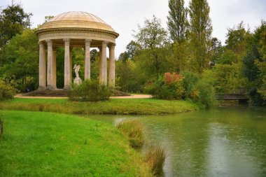 Versailles, France - October 2, 2022: Famous palace Versailles with beautiful gardens outdoors near Paris, France. 
