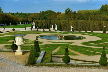 Versailles, France - October 2, 2022: Famous palace Versailles with beautiful garden and park