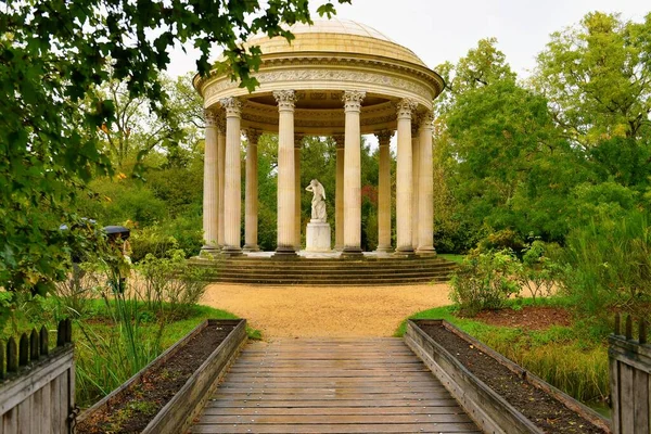 Versailles, France - October 2, 2022: Famous palace Versailles with beautiful gardens outdoors near Paris, France. 
