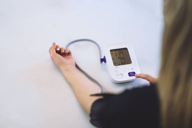 Monitoring patients blood pressure in examination room