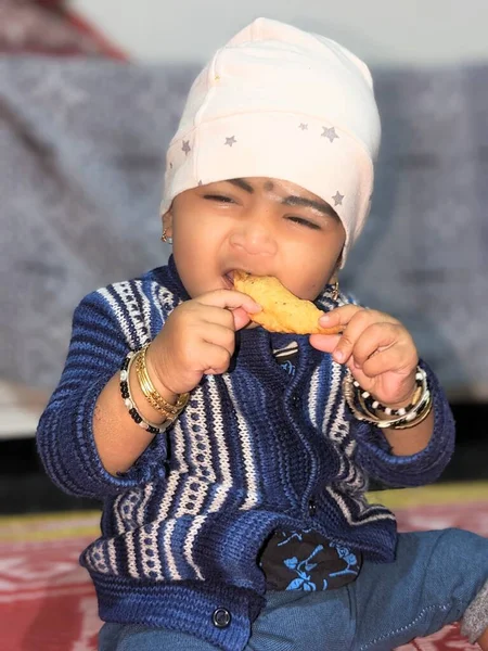 Stock image Cute baby Girl Eating with smiley expression