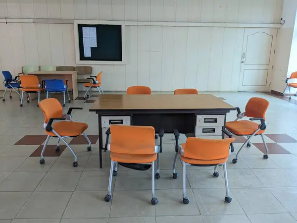 Empty Chairs and Table in the meeting hall