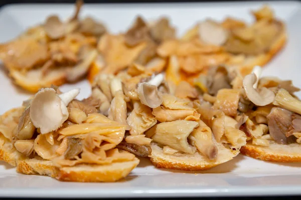 stock image Traditional mushroom burschetta with tomato and basil