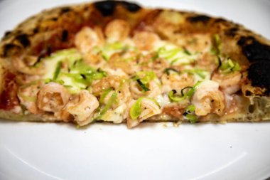 Rustic artisanal shrimp pizza with catupiry cheese and leeks clipart