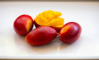 Brazilian mangoes of the Palmer species, ripe and isolated clipart