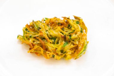 Rice croquette with leek, zucchini, fried vegetables clipart