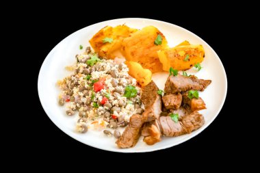 Traditional rustic tropical Brazilian dish, sun-dried beef with green beans, cassava, biquinho pepper. Creative rustic photography clipart