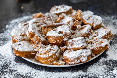 Authentic sweet Christmas French toast served with sugar and cinnamon in a Christmas atmosphere clipart