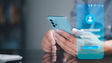 young businessman using a mobile phones to perform internal security encryption,Digital security unlocking or encryption, authorizing secure logins.2FA two-factor authentication
