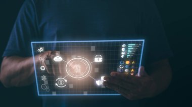 Young businessman scanning his fingerprint for security, cybersecurity concept on the internet, the concept on virtual screen with hands typing on the keyboard.